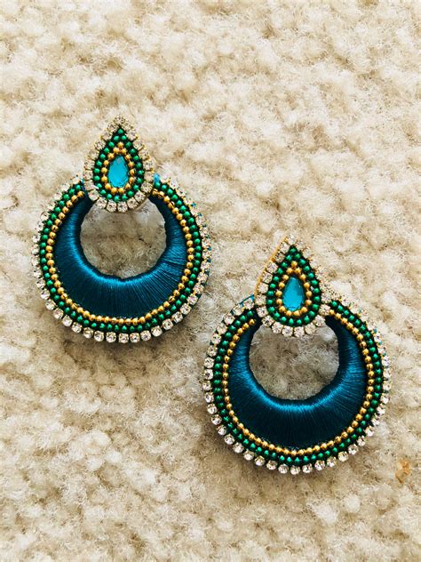 designer thread earrings.